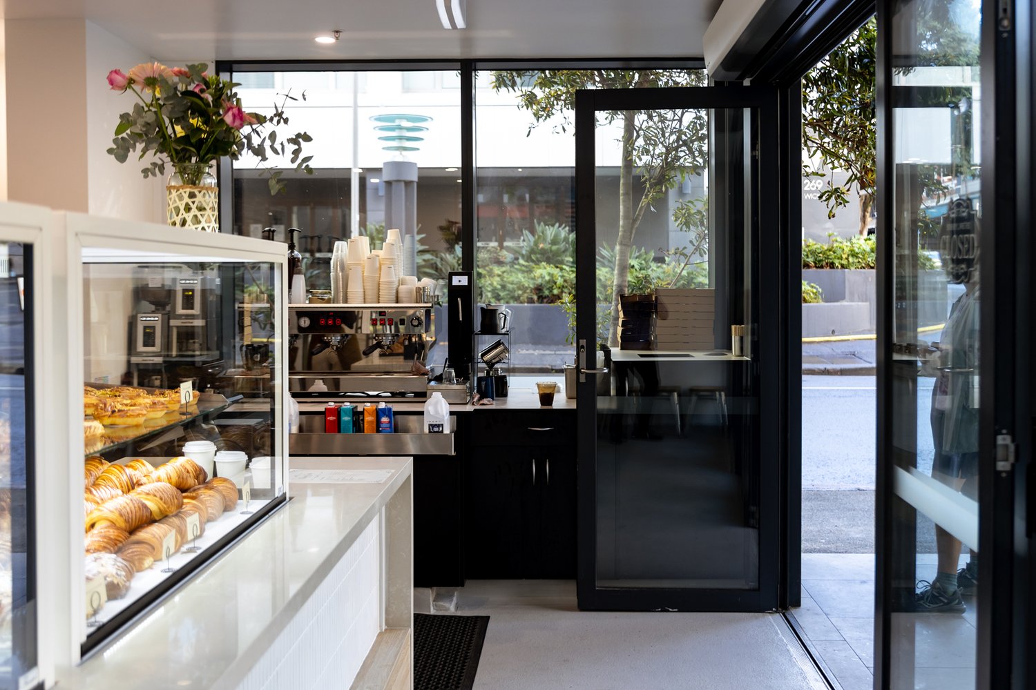 Inside the Eloise & Lou pâtisserie — the pastry display and counter